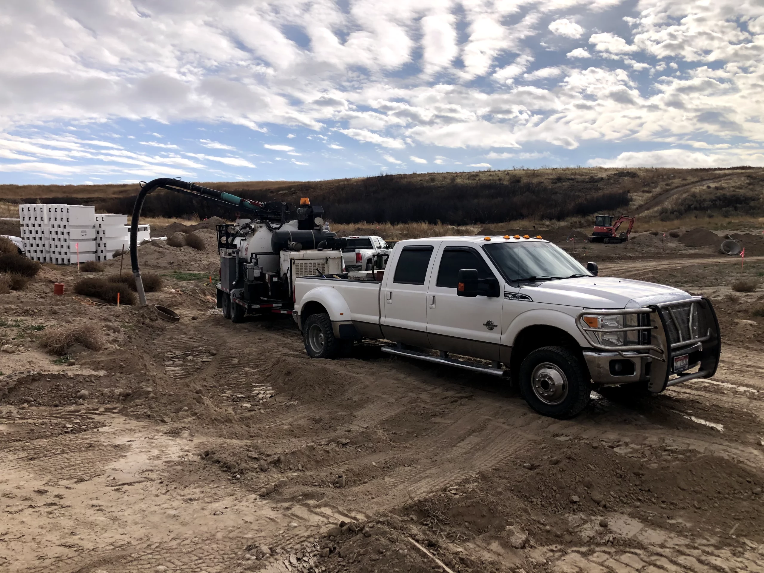A hydro excavation truck working on a job site in Eastern Idaho, using pressurized water and vacuum to safely expose underground utilities.